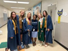 Grads with LES Principal Joretha Lockhart in 2023. LC File Photo.