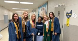 Grads with LES Principal Joretha Lockhart in 2023. LC File Photo.