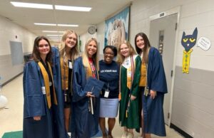 Grads with LES Principal Joretha Lockhart in 2023. LC File Photo.