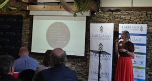 Kellye Stelling, Location Leader with Isaiah 117 House, delivereing an inspiring presentation.