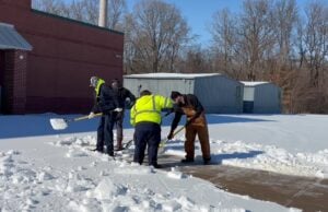 City of Lakeland Proclaims May 17–23, 2026 as Public Works Week Public works employees helping clean off a walkway to LES during the winter weather event Lakeland experienced this past winter.
